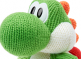 Amiibo Mega Yoshi de lana crece y pisotea el Wii U GamePad